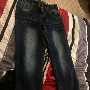dark navy blue Capri jeans . size 8 . brand is cato .
